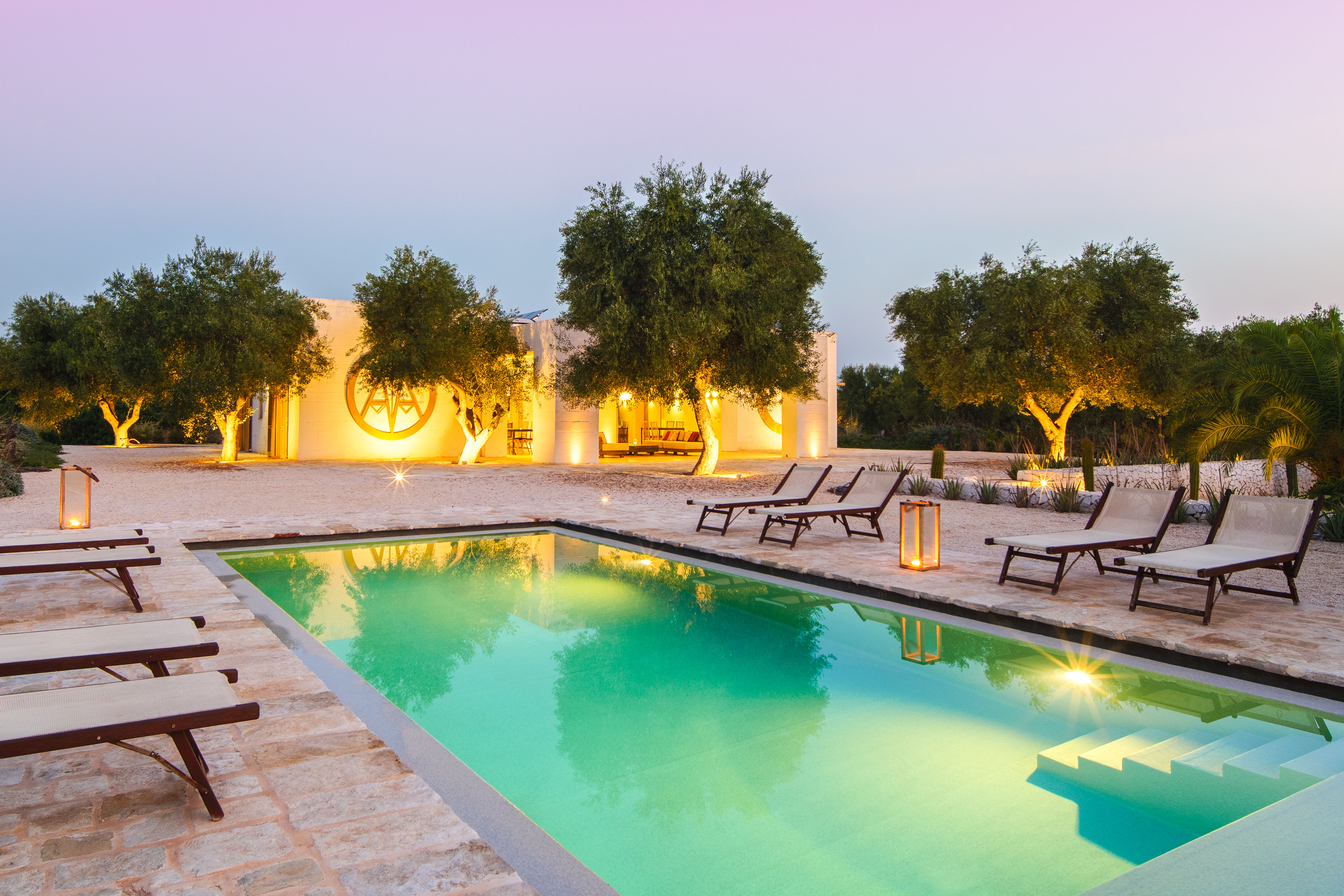 A pool and loungers at Tenuta Fonte, Montalbano, Brindisi, one of the best villas in Italy with a pool
