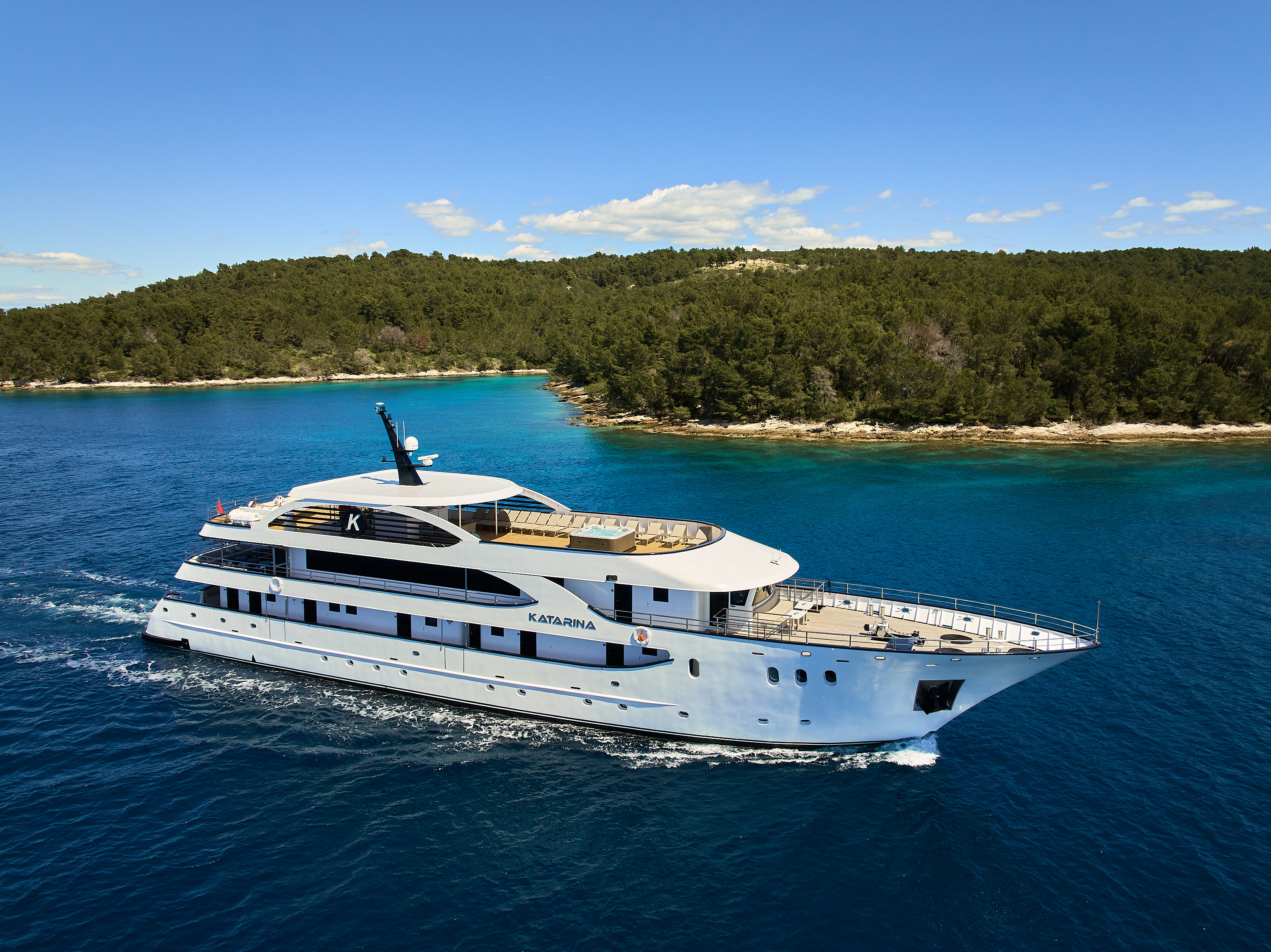 The Katarina yacht sailing in a Croatian bay.