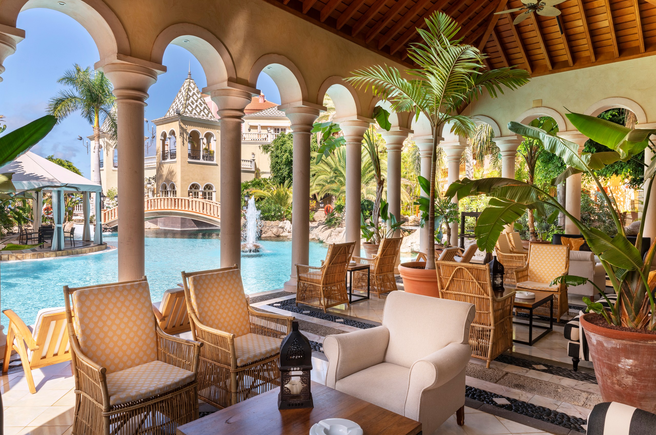A lounge by the pool at Hotel Bahia del Duque in Tenerife