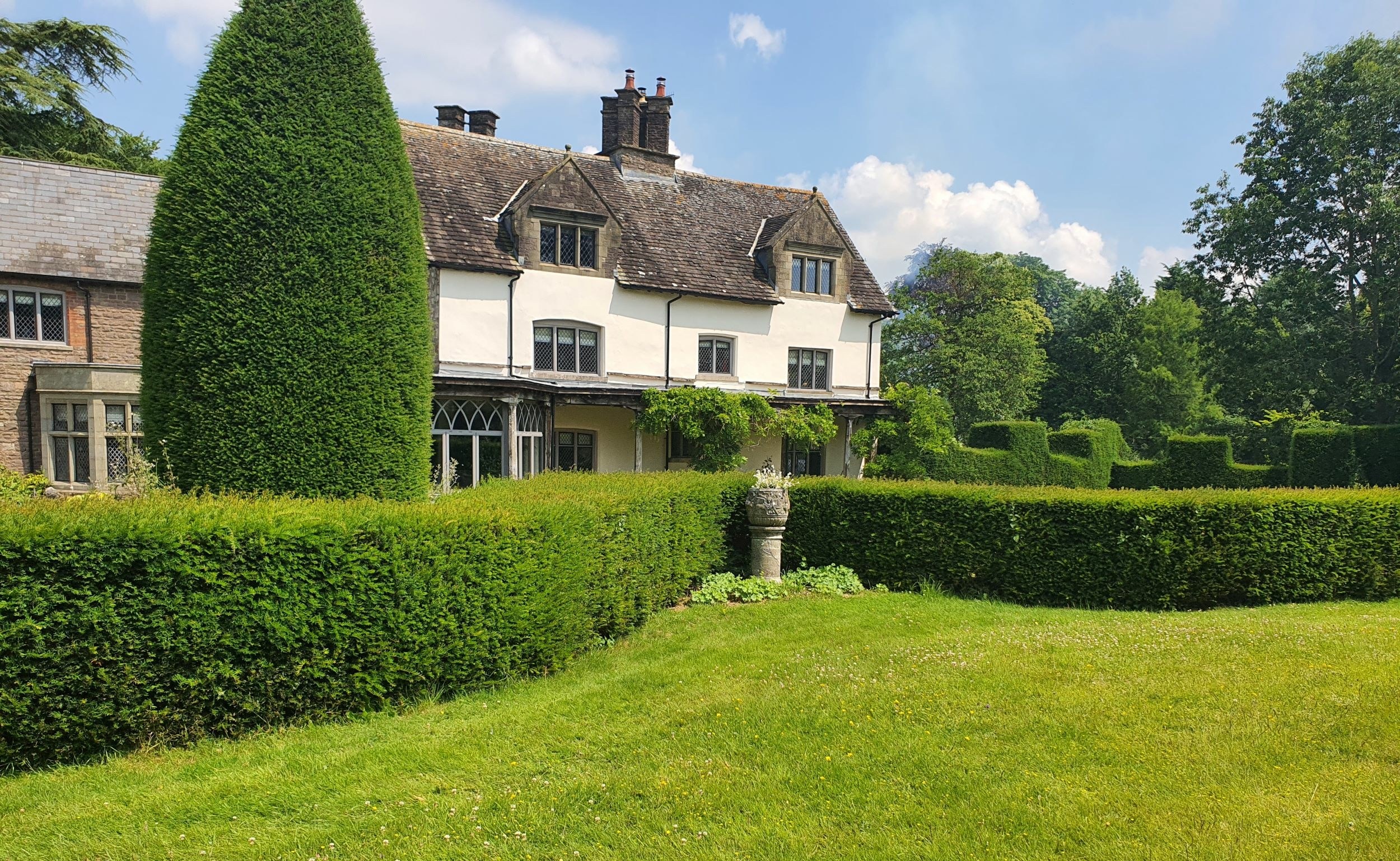 Goytre Hall set in scenic gardens.
