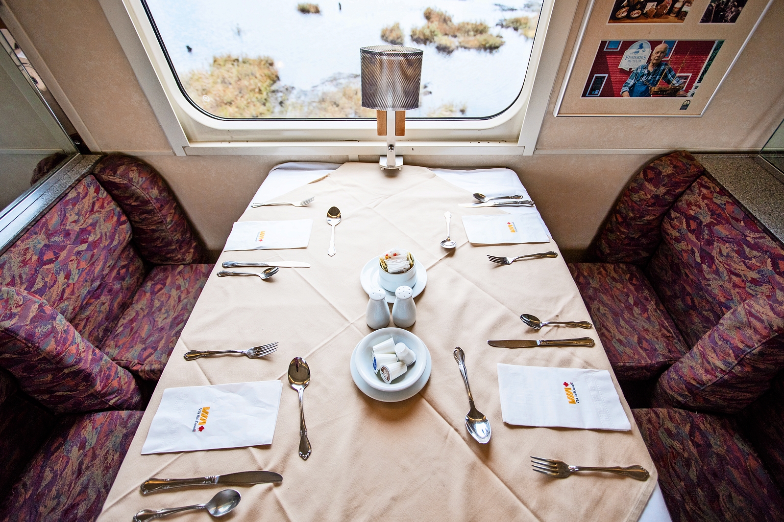 Table set for two in a VIA Rail train car.